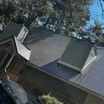 Metal roof installation and flashing
