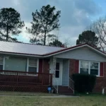 Metal roof installation from storm damage